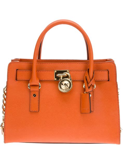 michael kors handtas oranje|Michael Kors Orange Handbags + FREE SHIPPING .